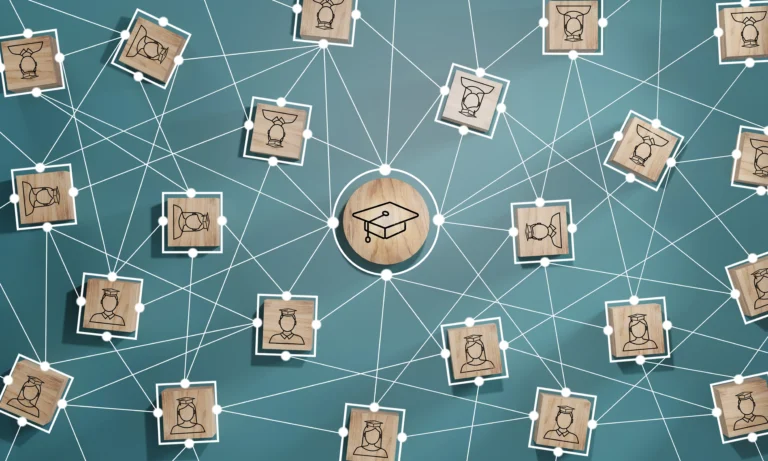 male-female-student-icons-wooden-blocks-education-concept-success