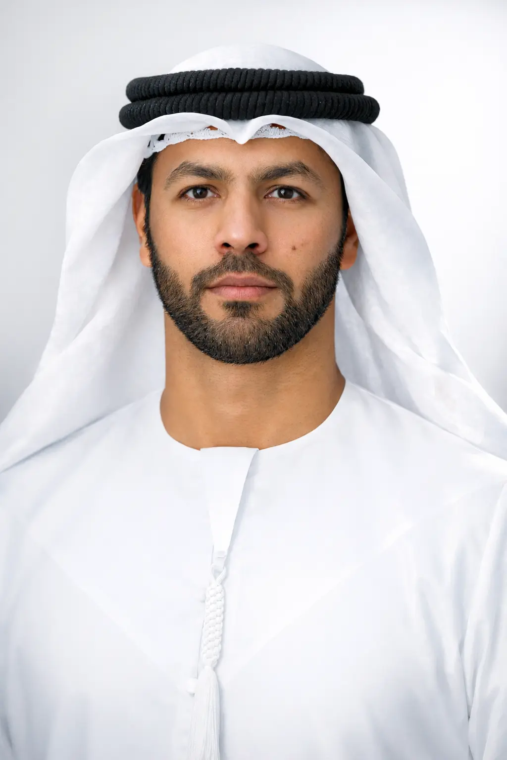 Formal studio portrait of ICESCO Director General Salim M. AlMalik in a white ghutra and kandura.